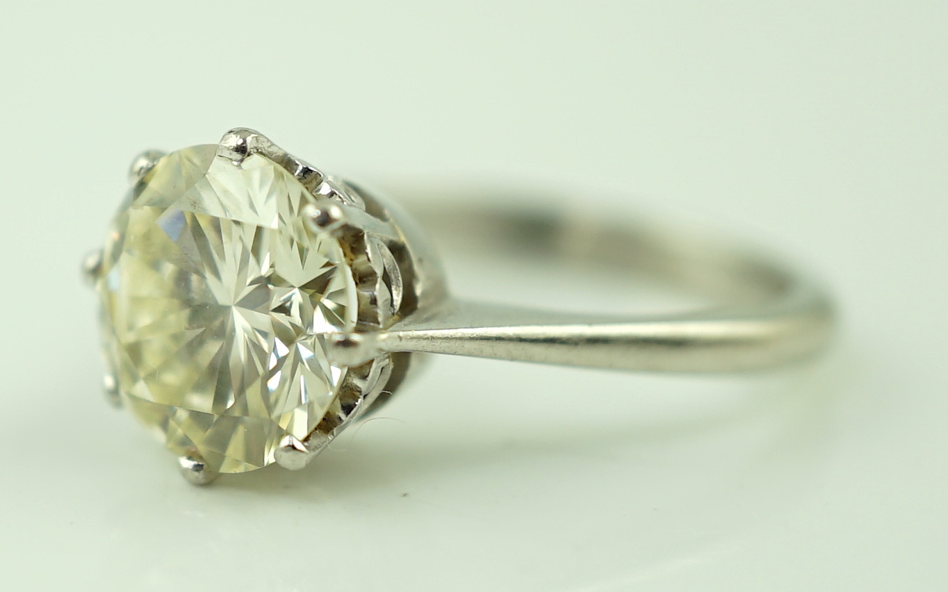 A platinum and solitaire diamond set ring